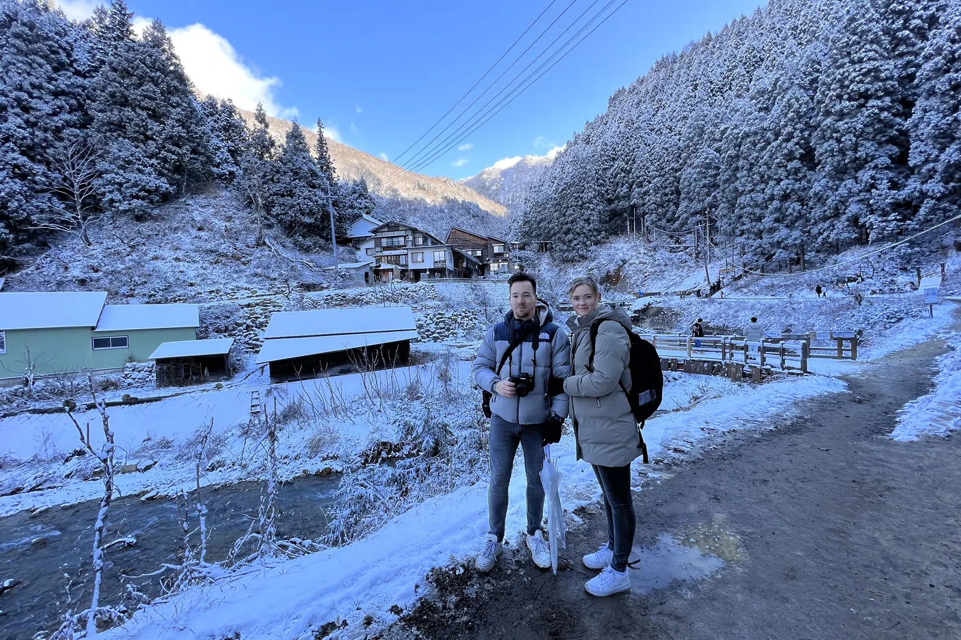 A snow-covered mountain village in the Nagano valley below Jigokudani, empty apart from the two of us