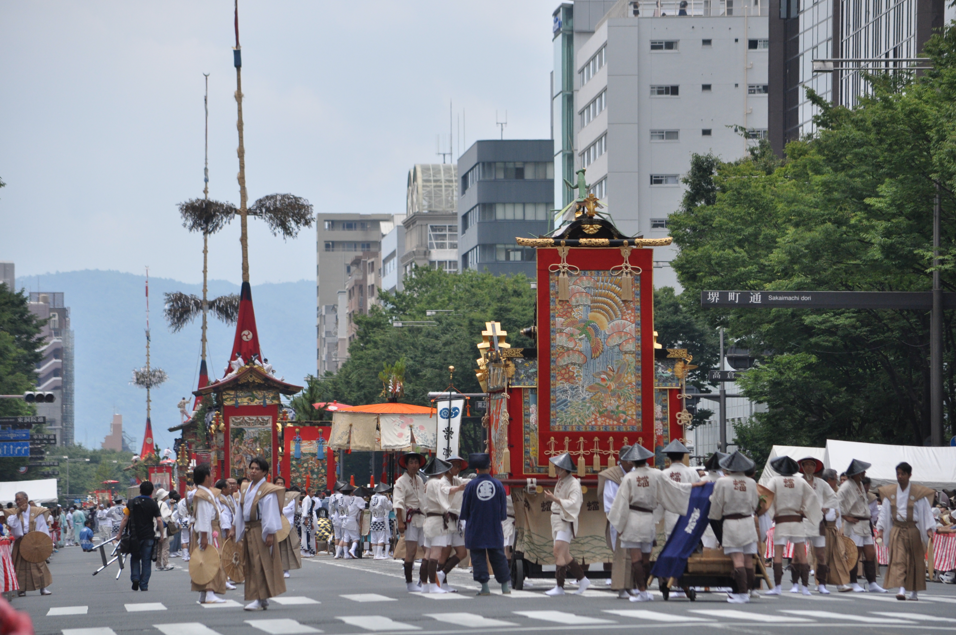 A tall Gion Matsuri hoko float in a Kyoto street