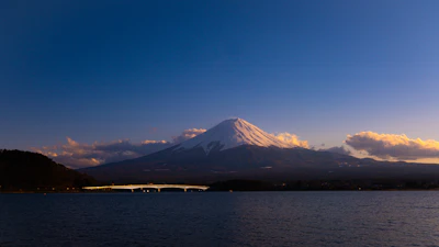 Mount Fuji reflected in Lake Kawaguchi at dawn