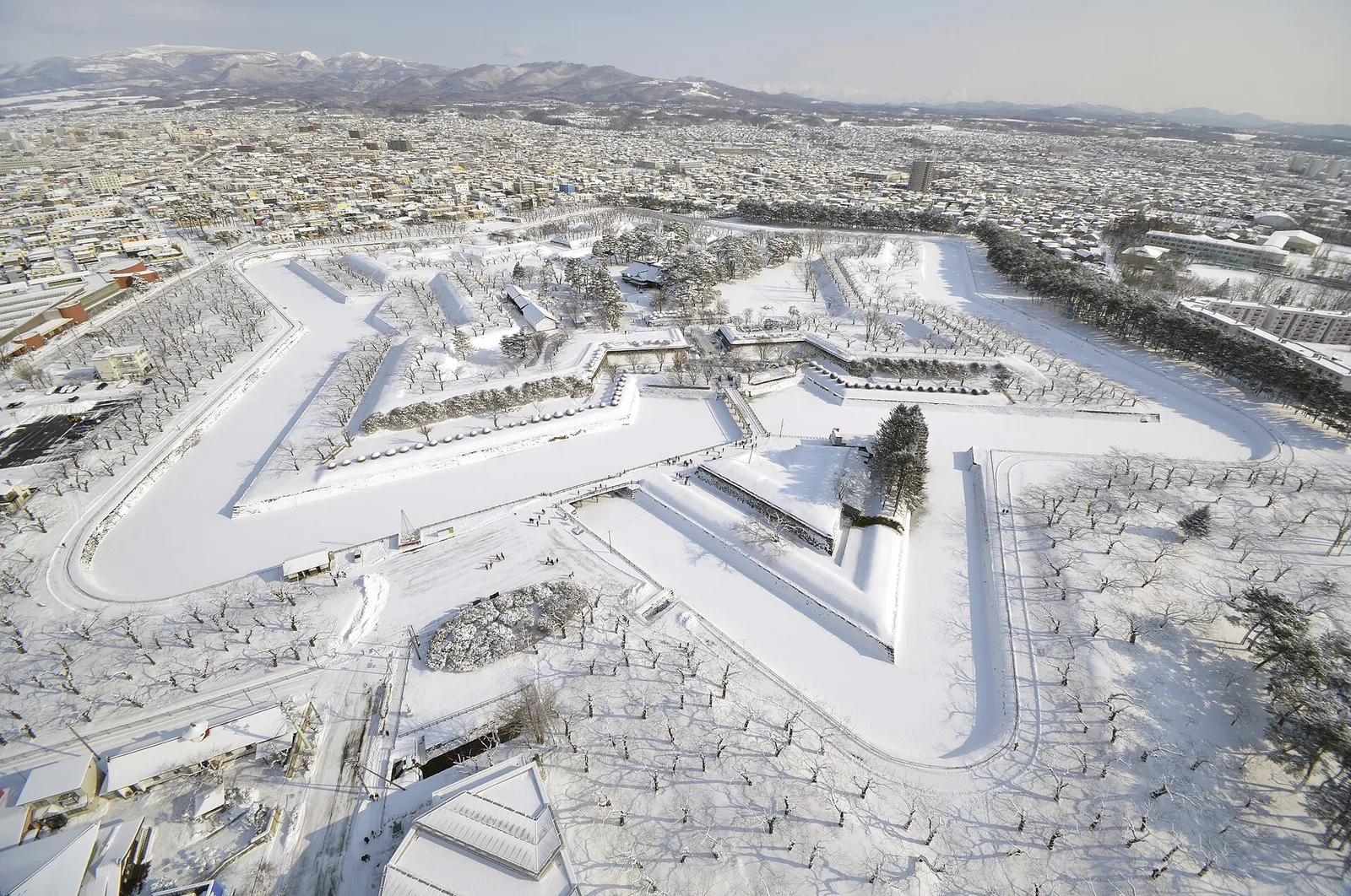The star-shaped Goryokaku fort covered in snow, seen from above