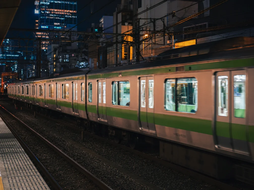 Yamanote train passing through Tokyo at night