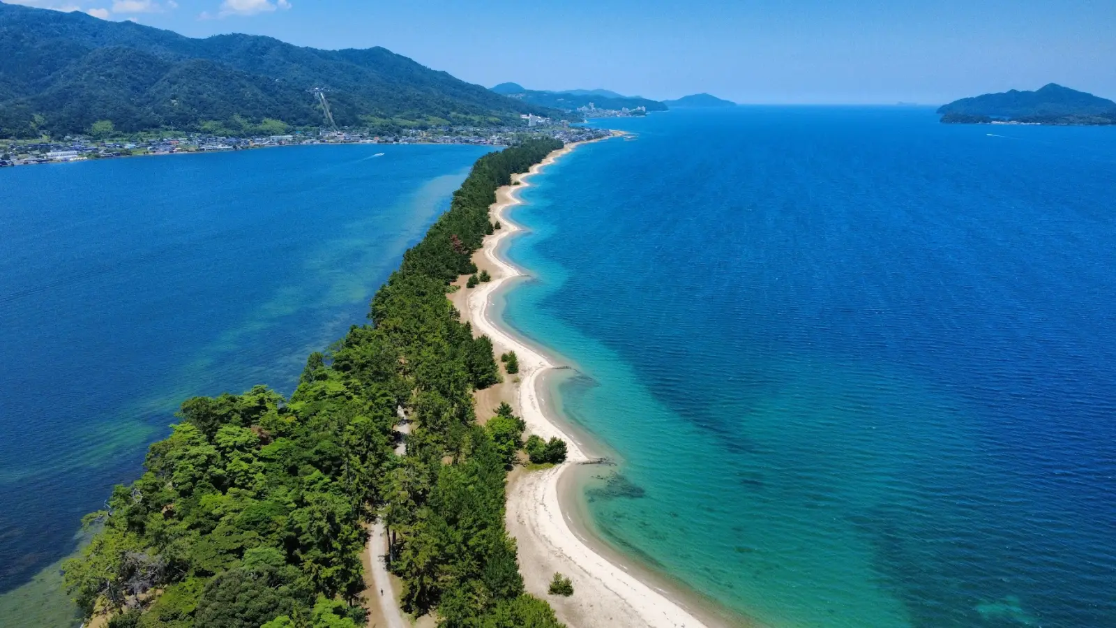 Amanohashidate sandbar viewed from Kasamatsu Park with pine trees and Miyazu Bay