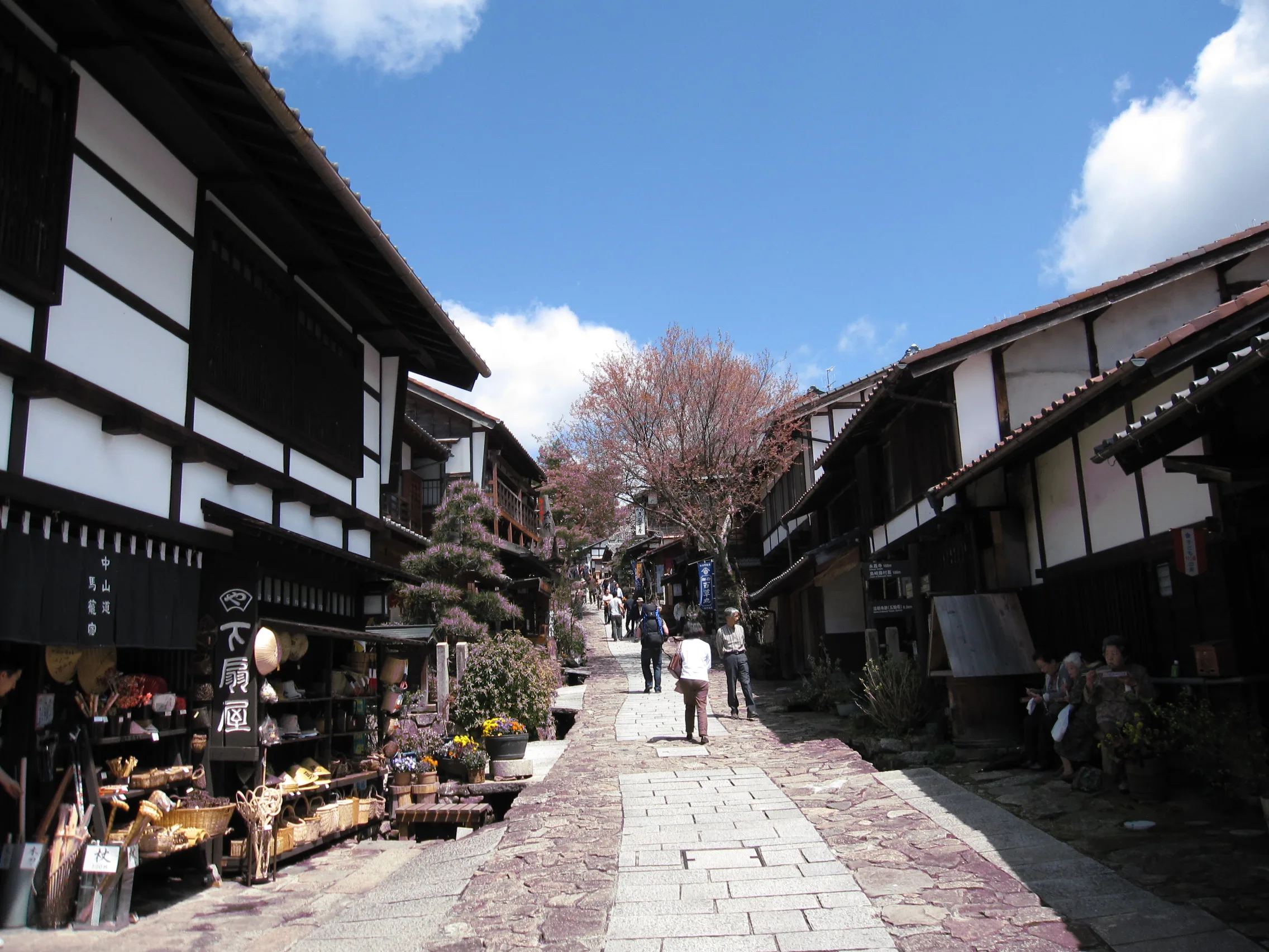 Stone-paved street of Magome-juku lined with wooden Edo-period buildings