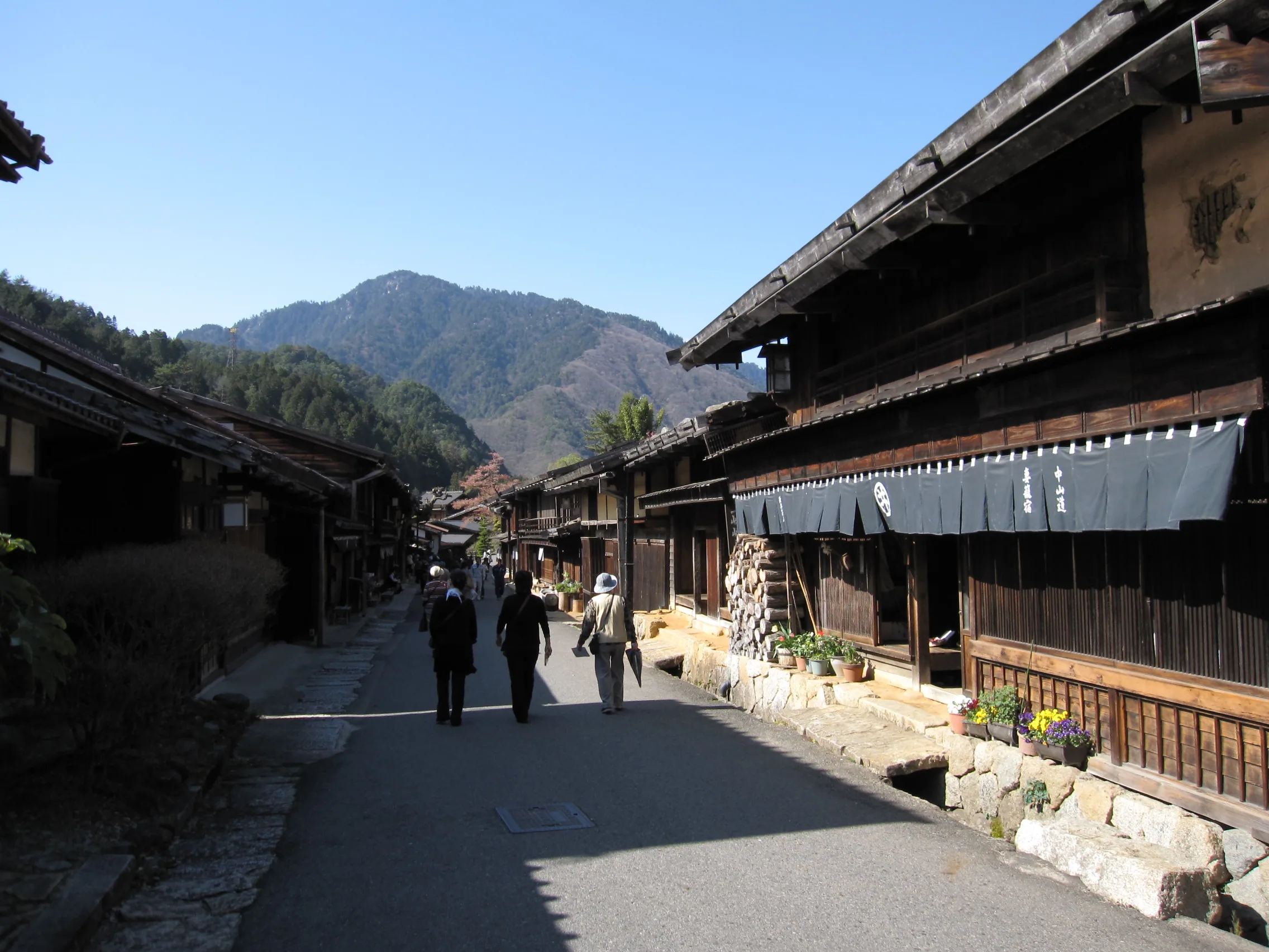 Preserved wooden facades on the main street of Tsumago-juku