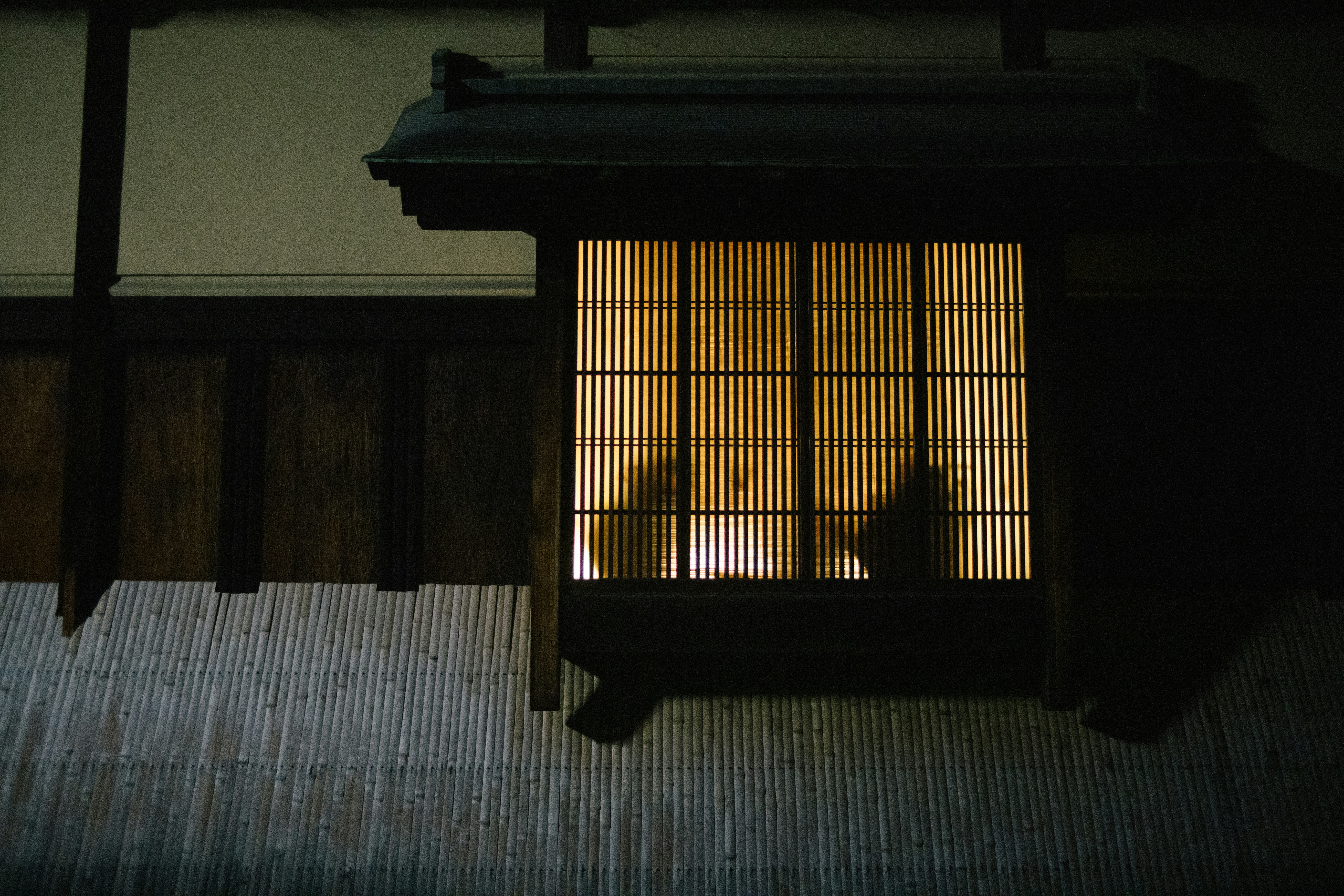 Kyoto ryokan room with tatami and shoji light