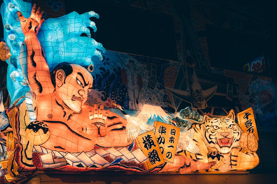 Aomori Nebuta festival giant illuminated warrior float in night procession
